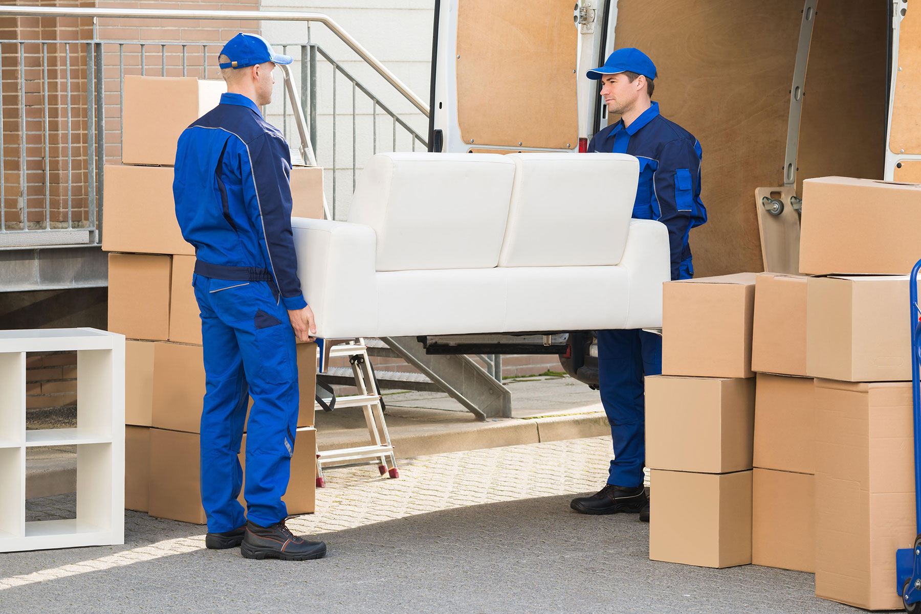 Movers Moving a Couch